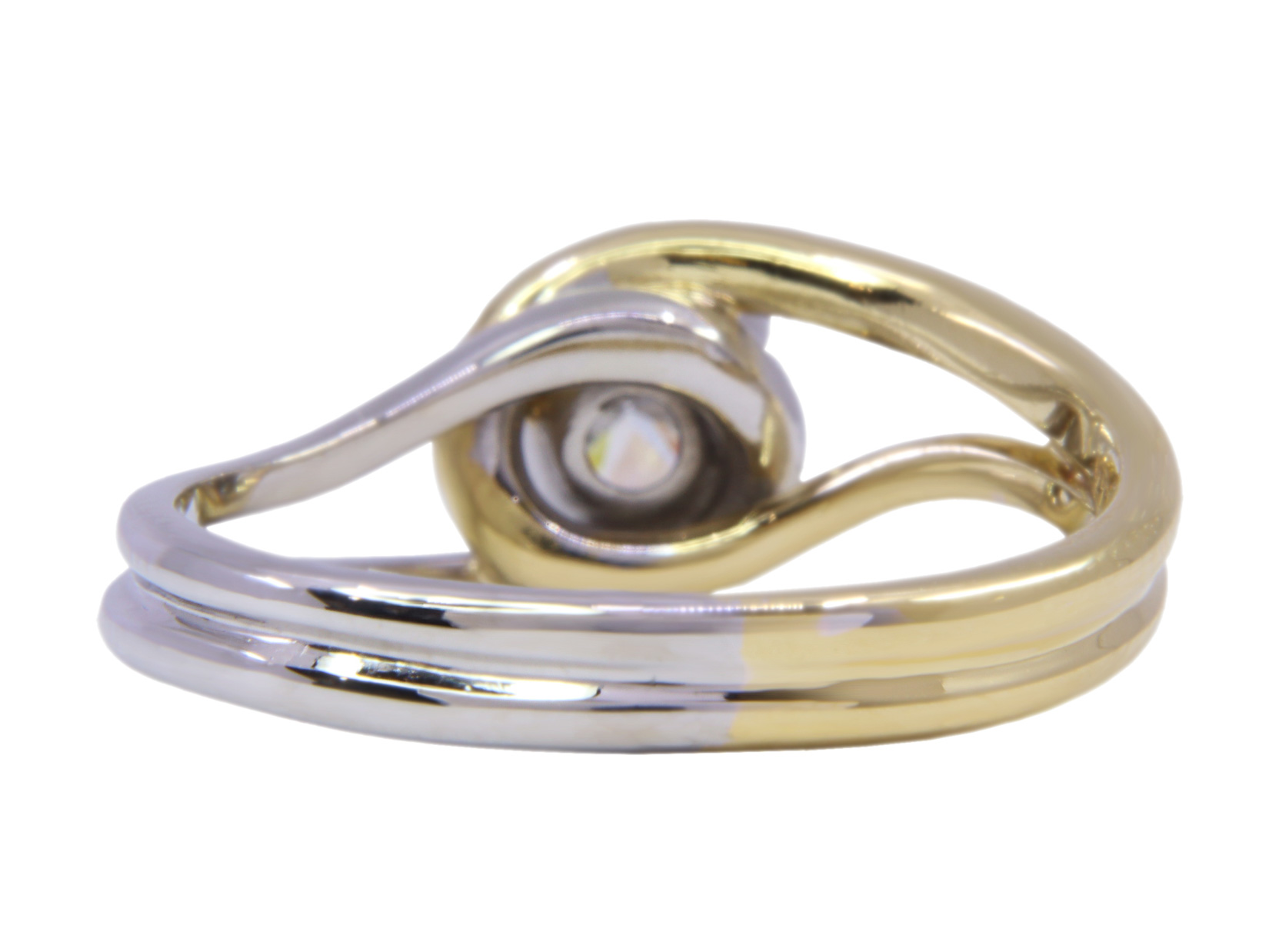 Anello in oro bianco e giallo titolo 18kt con brillante stimato di 0,40 ct