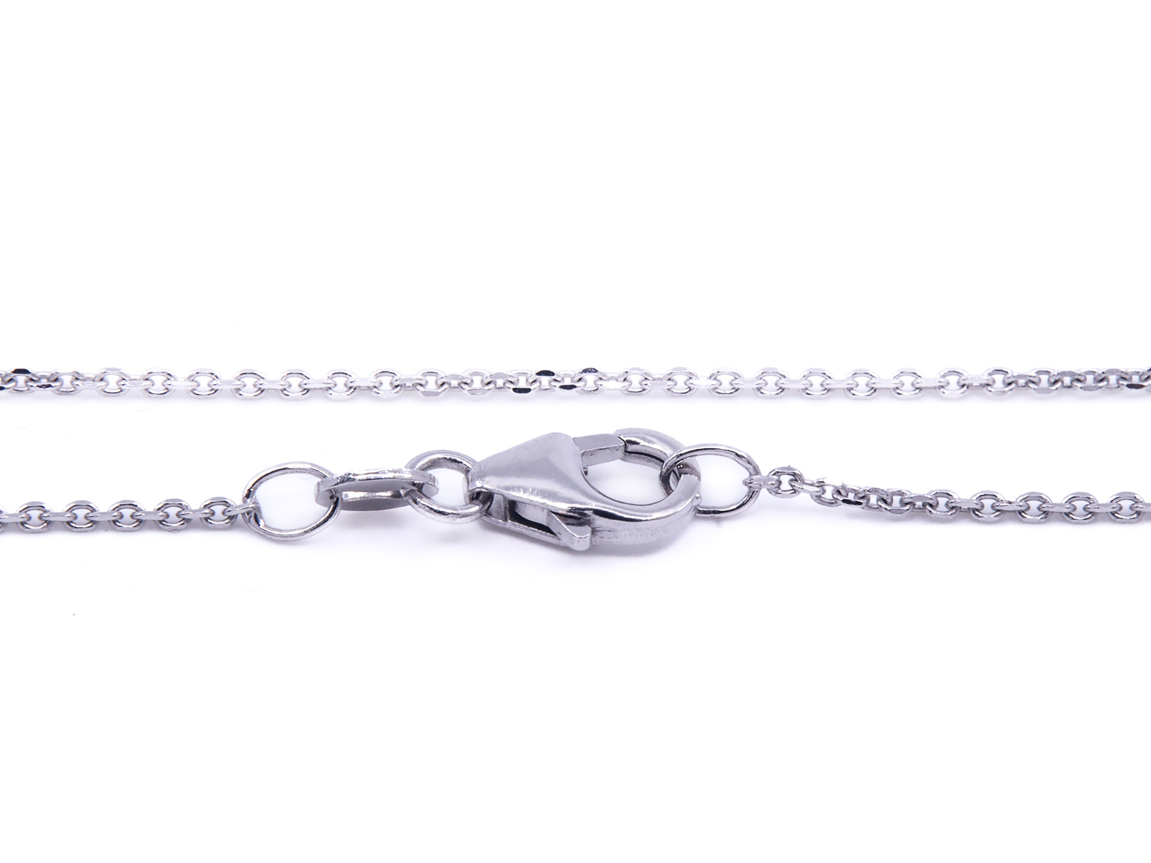 Collana in oro bianco 18 kt. di gr. 3,7 con smeraldo e brillanti