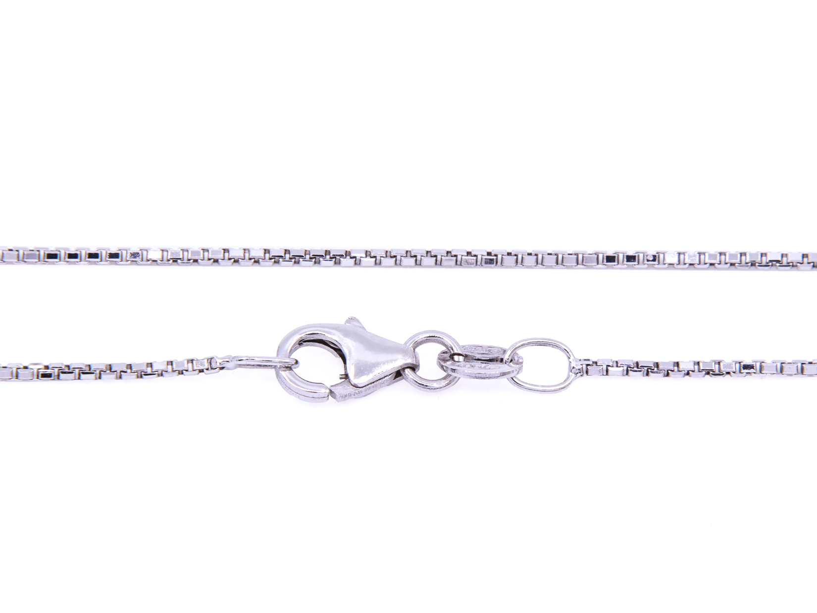 collino ob. Con rubino ovale centrale mozambico ct. 0.69 e brills attorno di ct. 0.30 fg vvs