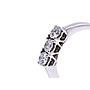 Anello modello trilogi in oro bianco a titolo750/°°° di grammi2.60 con tre diamanti naturali di carati 0.15 cad.